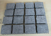 Il ciottolo basale nero che pavimenta i mattoni, abbellisce le pietre per lastricati del granito nero